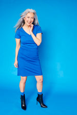 Load image into Gallery viewer, Woman wearing a Monochrome blue pencil skirt.
