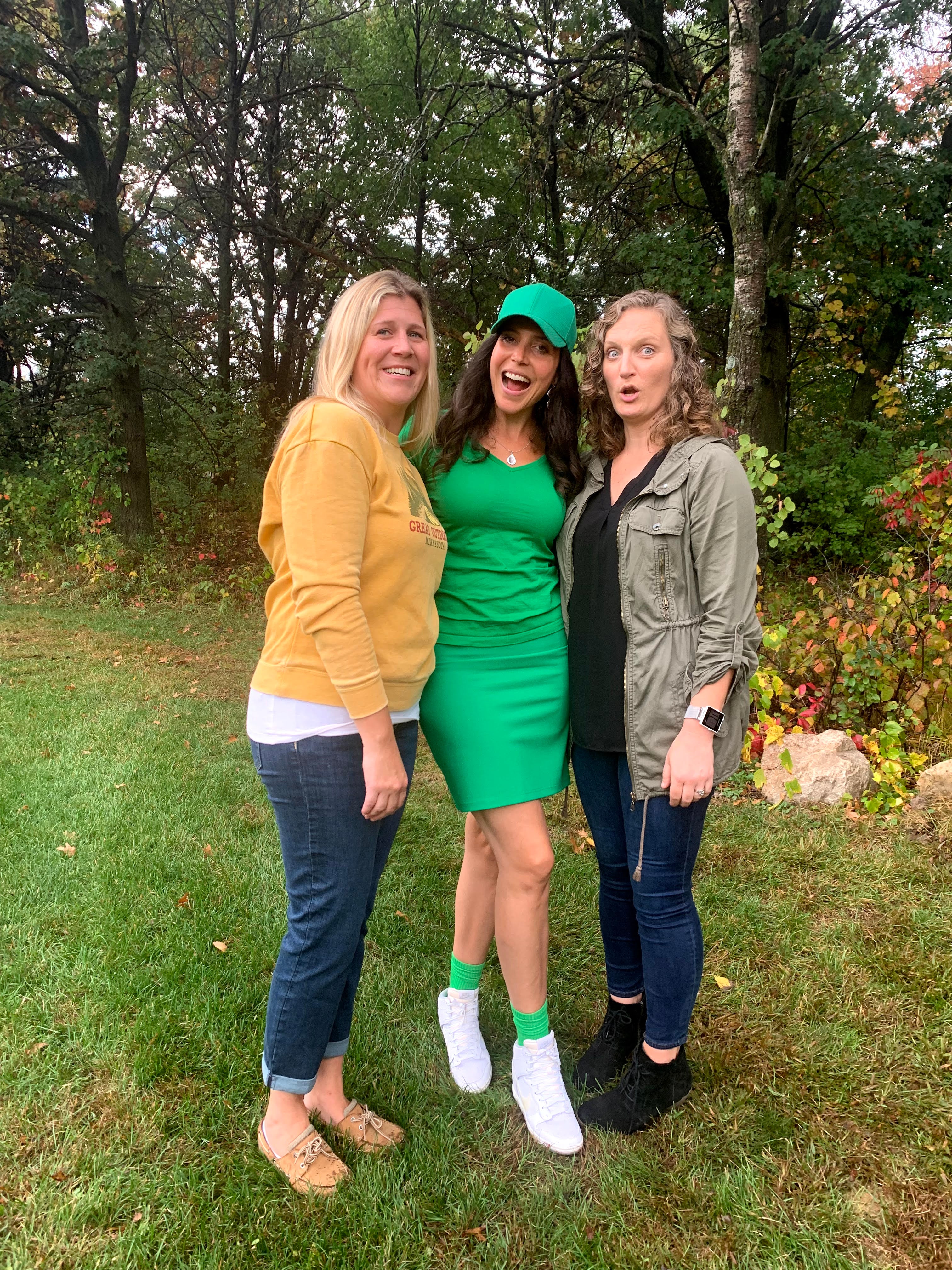 A woman wearing a green Monochrome pencil skirt.